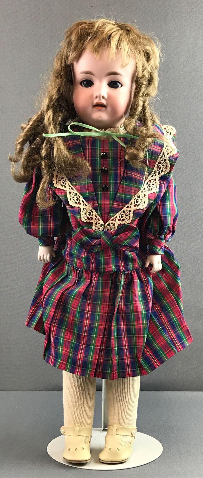 Antique 22 inch German bisque doll Marseille: Armand Marseille, 370, AM-4-DEP. Shoulder head, blue sleep eyes with painted lashes, open mouth with teeth, leather body, bisque hands. Plaid dress, under garments, stockings, shoes. Light brown hair 