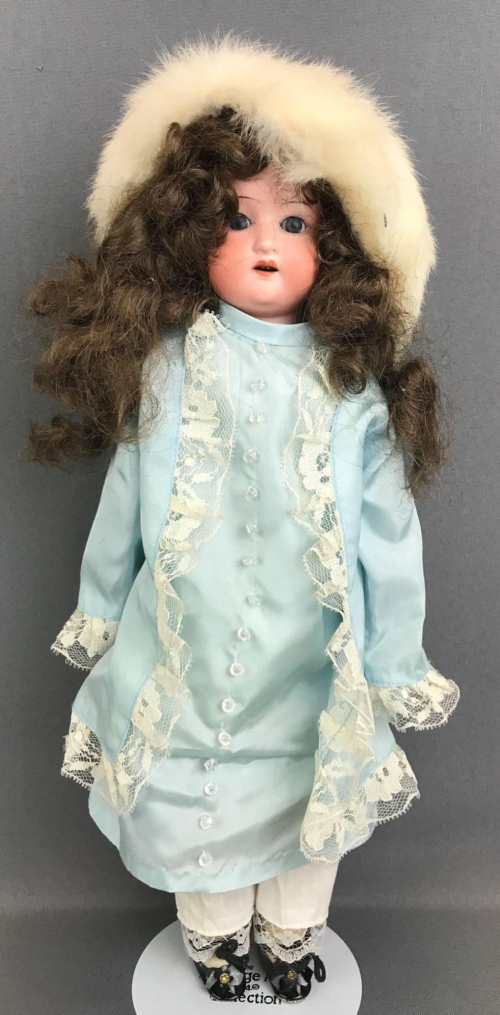 Antique 16 inch German bisque doll Heubach Koppelsdorf: II, Heubach, 275. 9/0 Koppelsdorf. Shoulder head, blue glass sleep eyes with painted lashes, leather and fabric body with bisque hands, open mouth with teeth. Blue dress with lace, hat, under garments