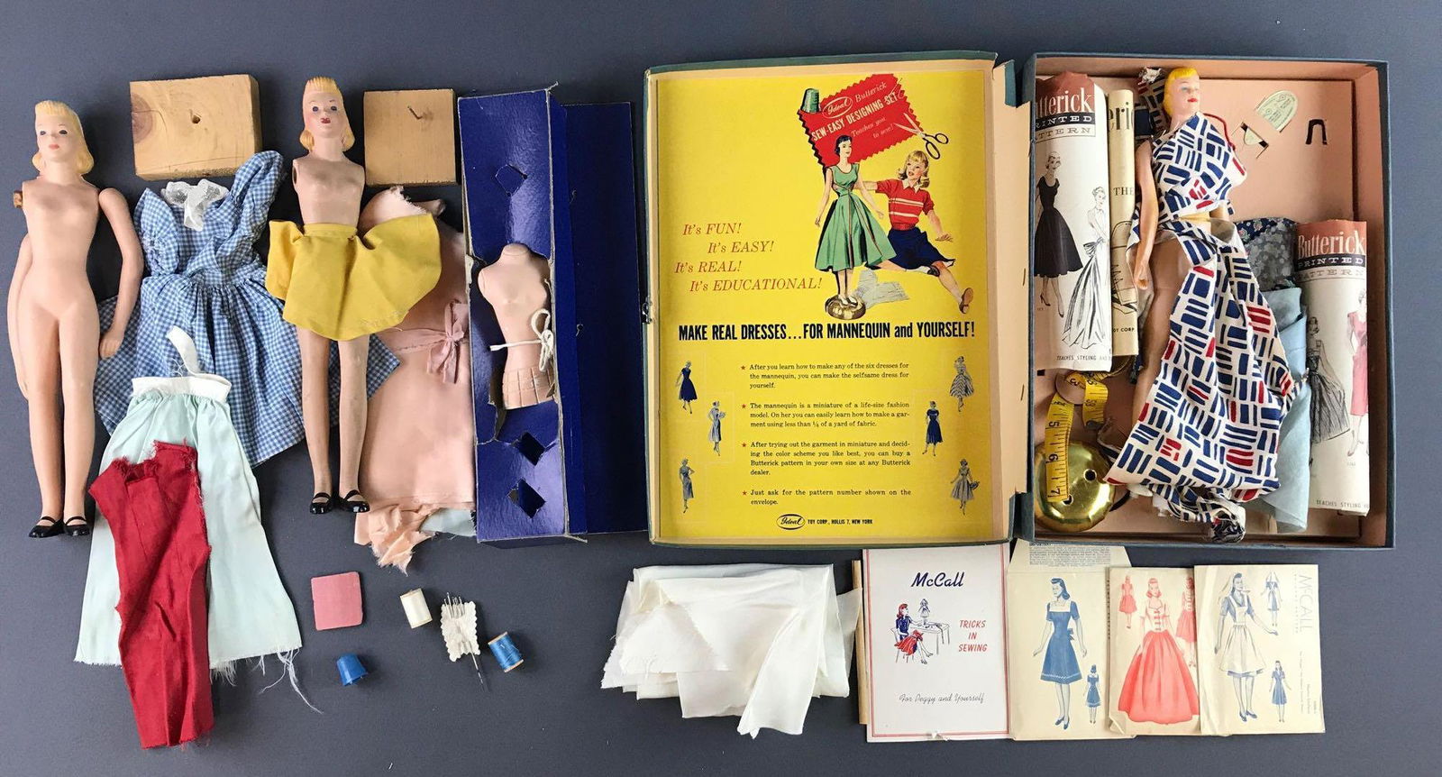 Group of 2 vintage Doll Fashion Sewing Kits: Includes McCall Peggy Fashion Model Sewing Kit containing two composition mannequins, Kloster thread, fabric, and three dress patterns; Ideal Butterick Sew-Easy Design Set containing composite mannequ