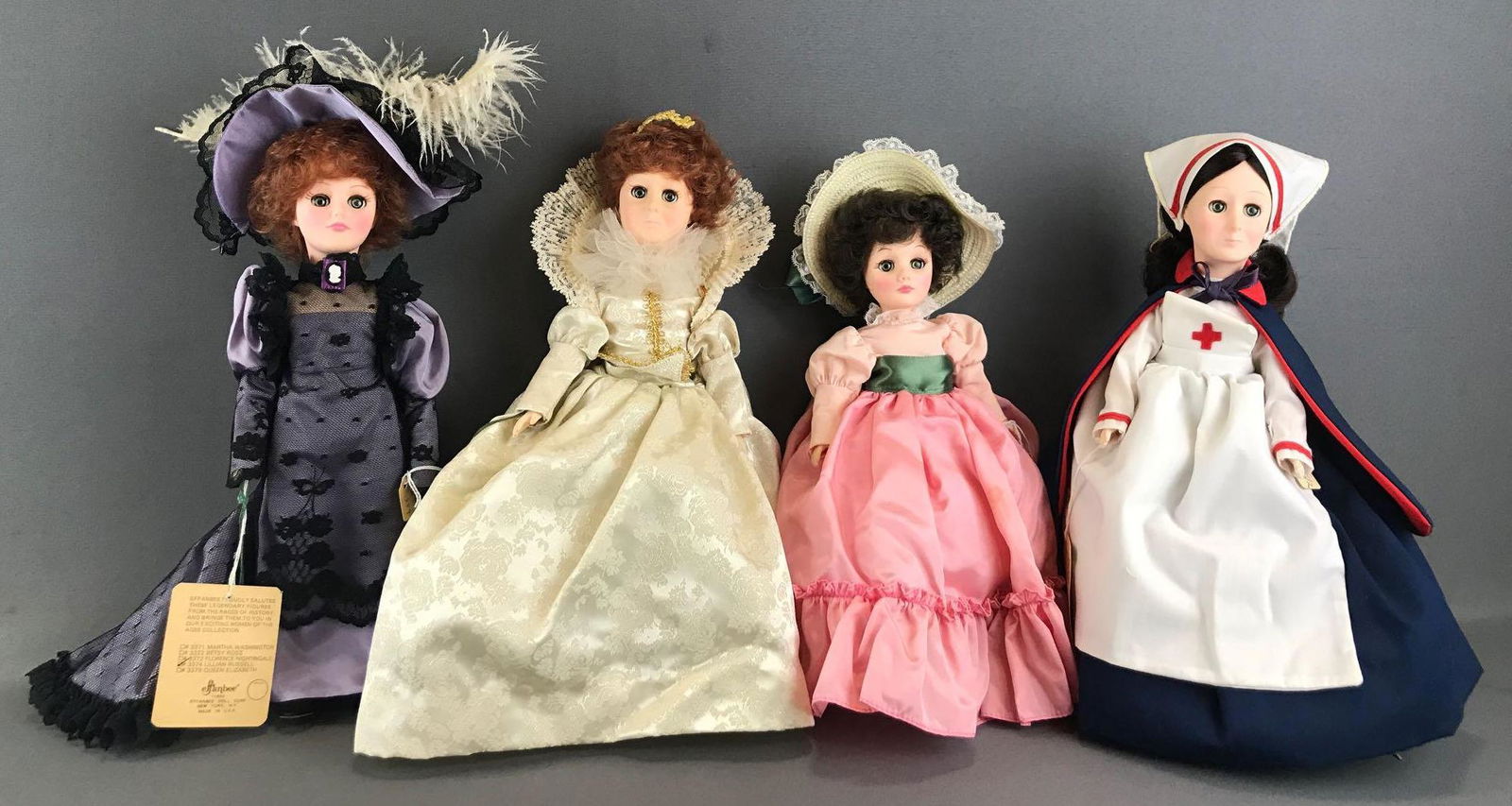 4 piece Group Effanbee Women of the Ages Collection: Includes Lillian Russell, Florence Nightingale, and Queen Elizabeth. Fourth doll is an unidentified Effanbee. Largest is 13 inches. Unknown completion