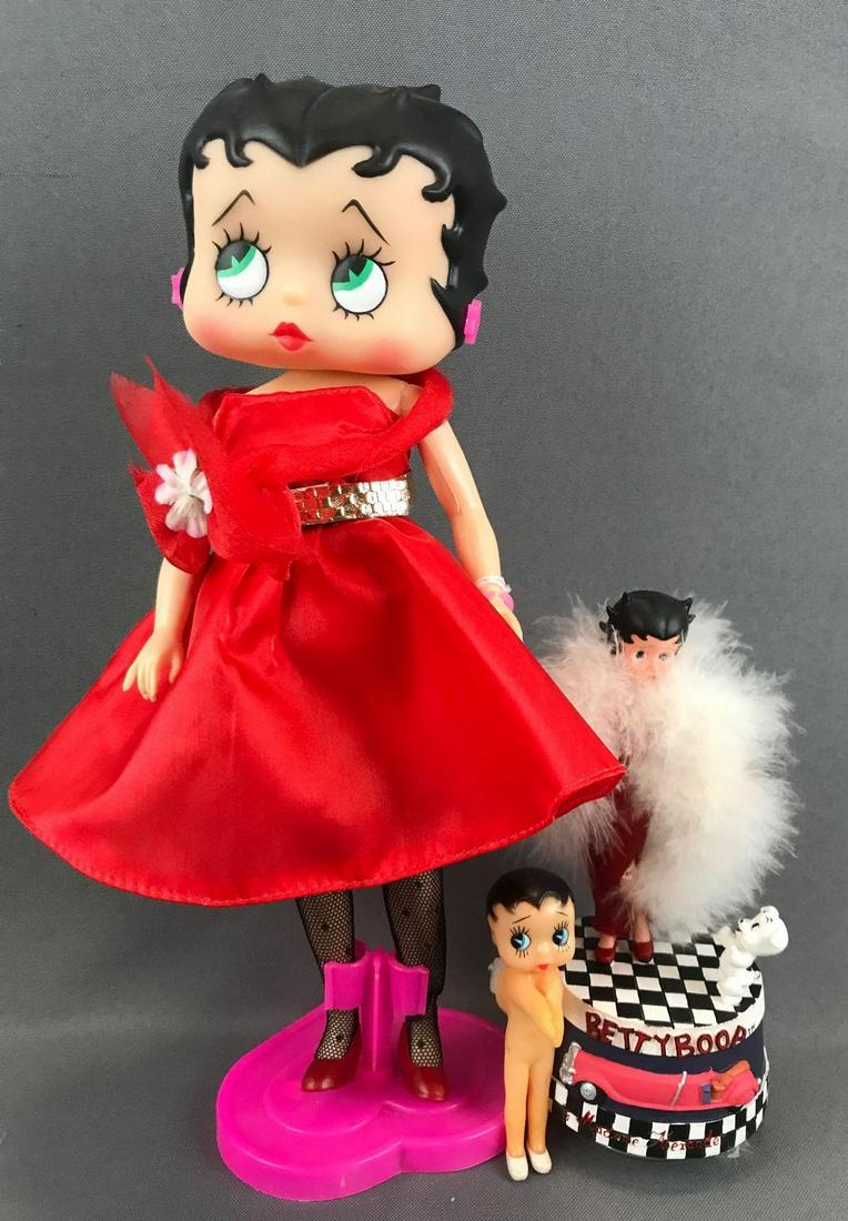 3 piece group Betty Boop dolls and music box: Largest is 11.5 inches. Music box is in working condition and plays I Wanna Be Loved by You