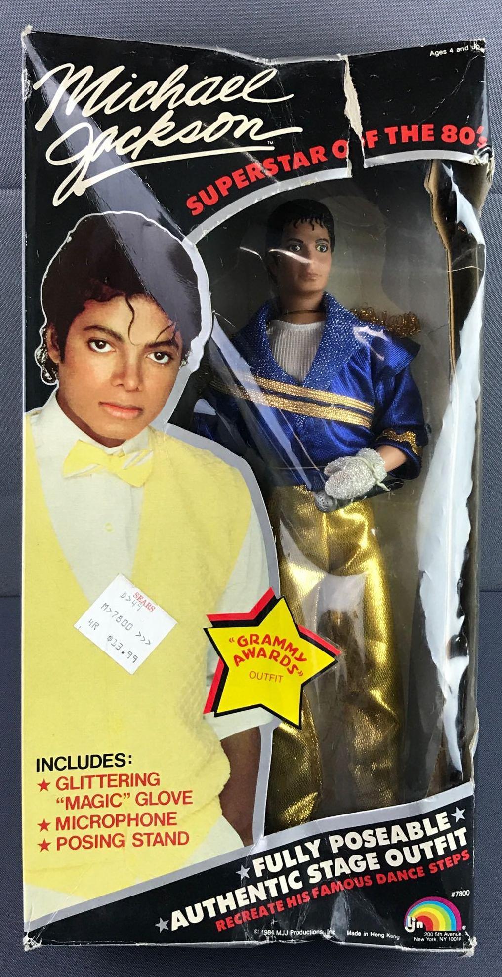 Ljn Michael Jackson poseable action figure in original: Grammy Awards outfit, measures 7x14x2.75 inches, packaging dented and torn, doll like new condition.