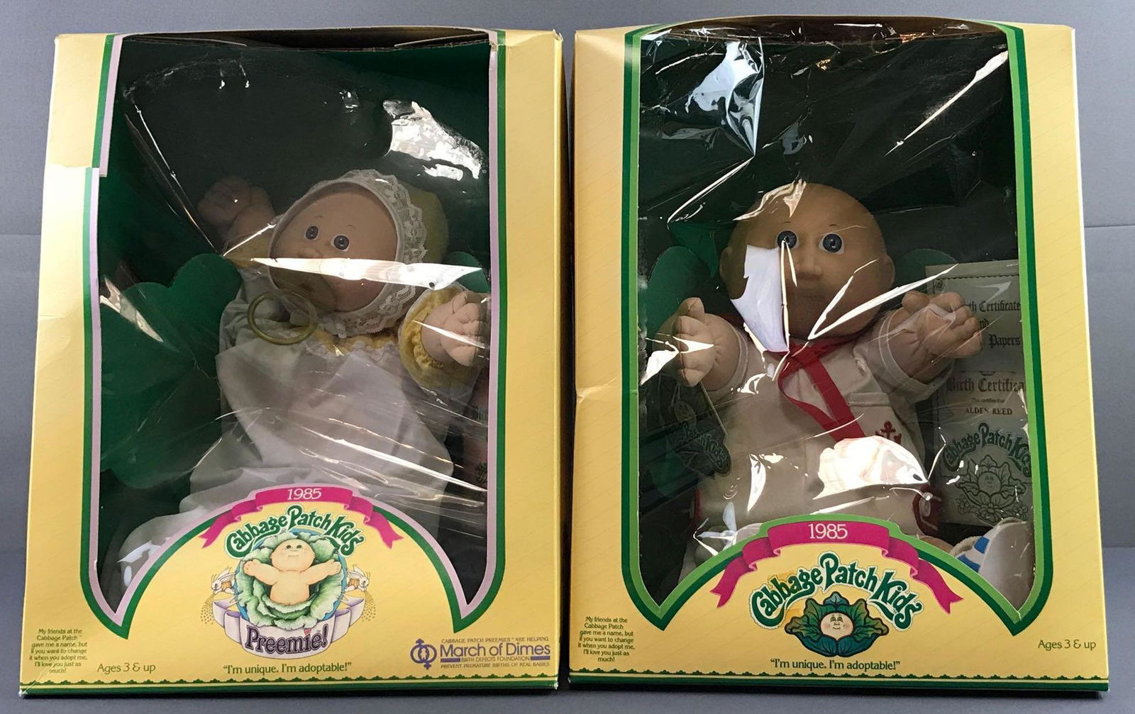 Group of 2 1985 Cabbage Patch Kids Dolls in original: Includes Preemie Nia Elise and Alden Reed. Packaging cellophane detached on both and tear on preemie packaging. Like new condition measuring 11.5x14.5x11.5 inches.