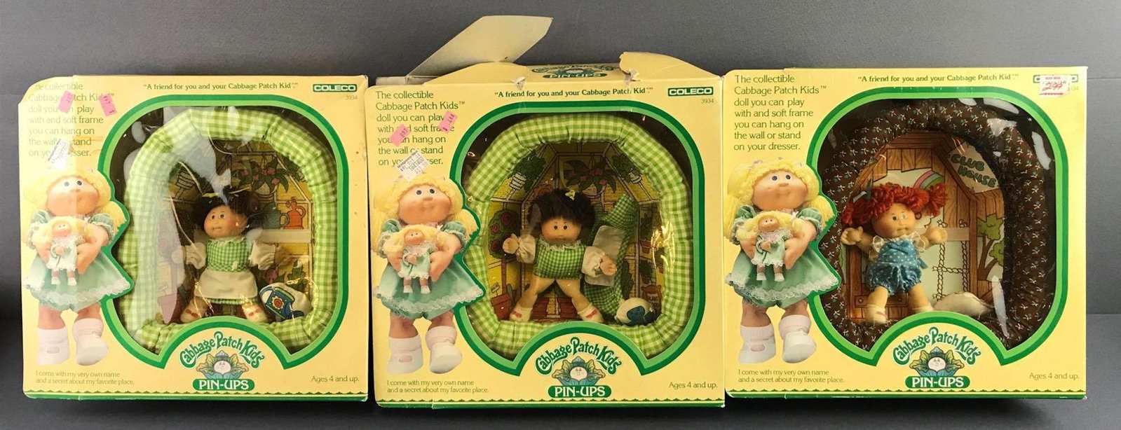 Group of 3 Cabbage Patch Pin-Ups: Includes Charlene Jenny and her Clubhouse and Minni Christie and her Garden Greenhouse. Packaging on one ripped and open, others like new condition. Measures 12x11x3.25 inches