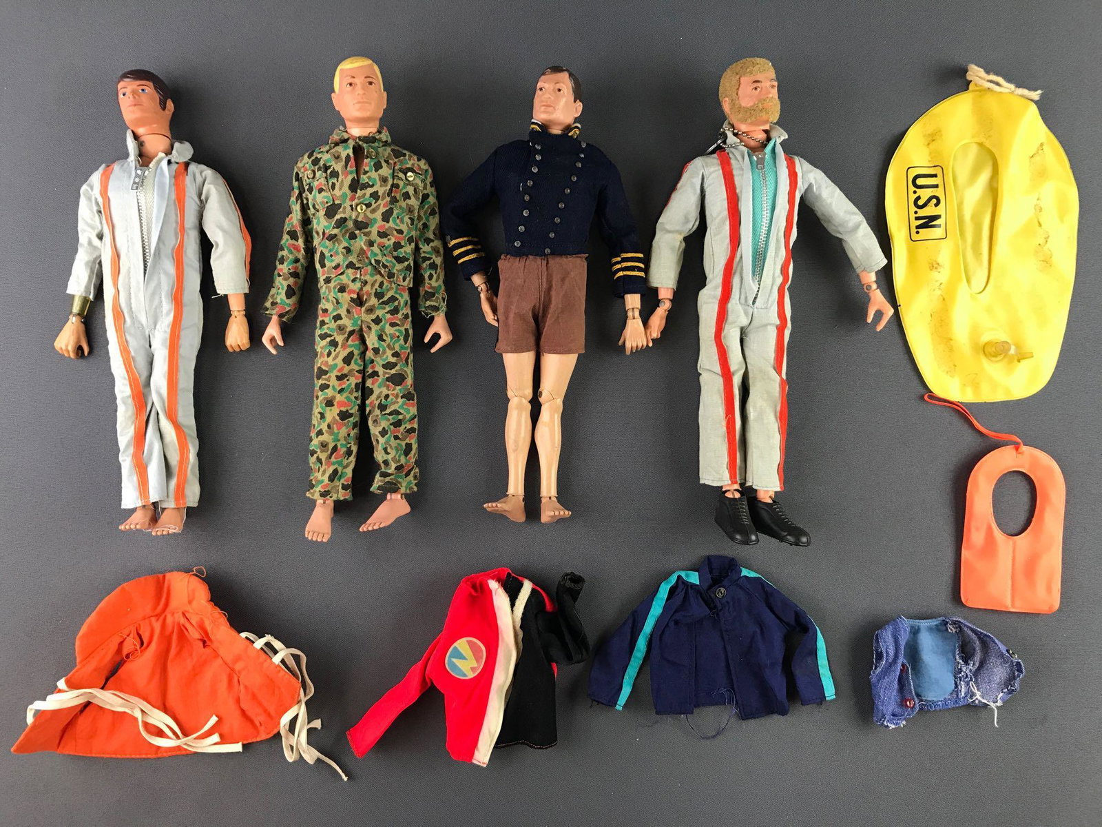 Group of 10 G.I. Joe action figures and accessories: By Hasbro Includes 4 action figures measuring 12x4x1.5 inches, raft, life vest and more. In used condition.