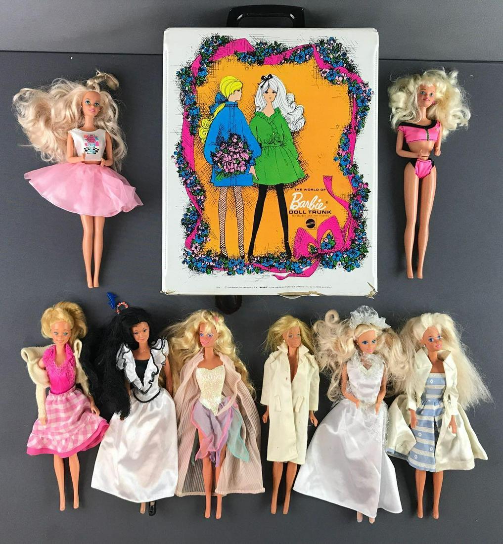 Group of 9 Mattel Barbies and vintage doll trunk: Trunk measures 13x10.25x7 inches. Wear consistent with age and use, in used condition.