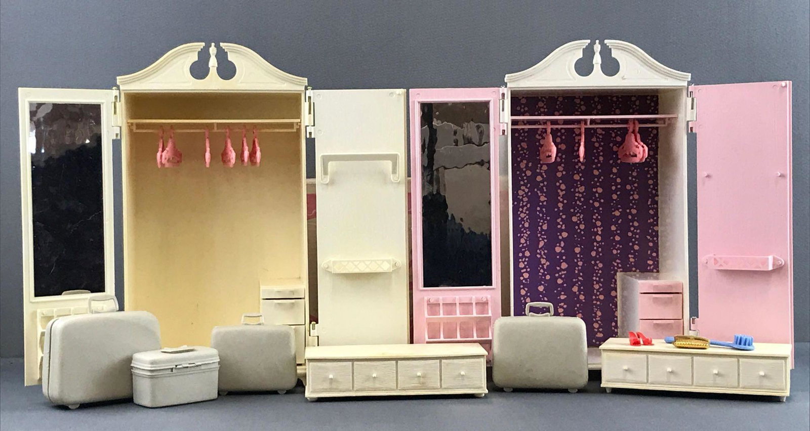 Mattel Barbie Susy Goose Wardrobe and accessories: Measures 13x7.5x4 inches. Susy Goose by Kiddie Brush and Toy Co. Includes original packaging for white wardrobe. Pink wardrobe missing rod on right door, dresser missing leg. Wear consistent with age 