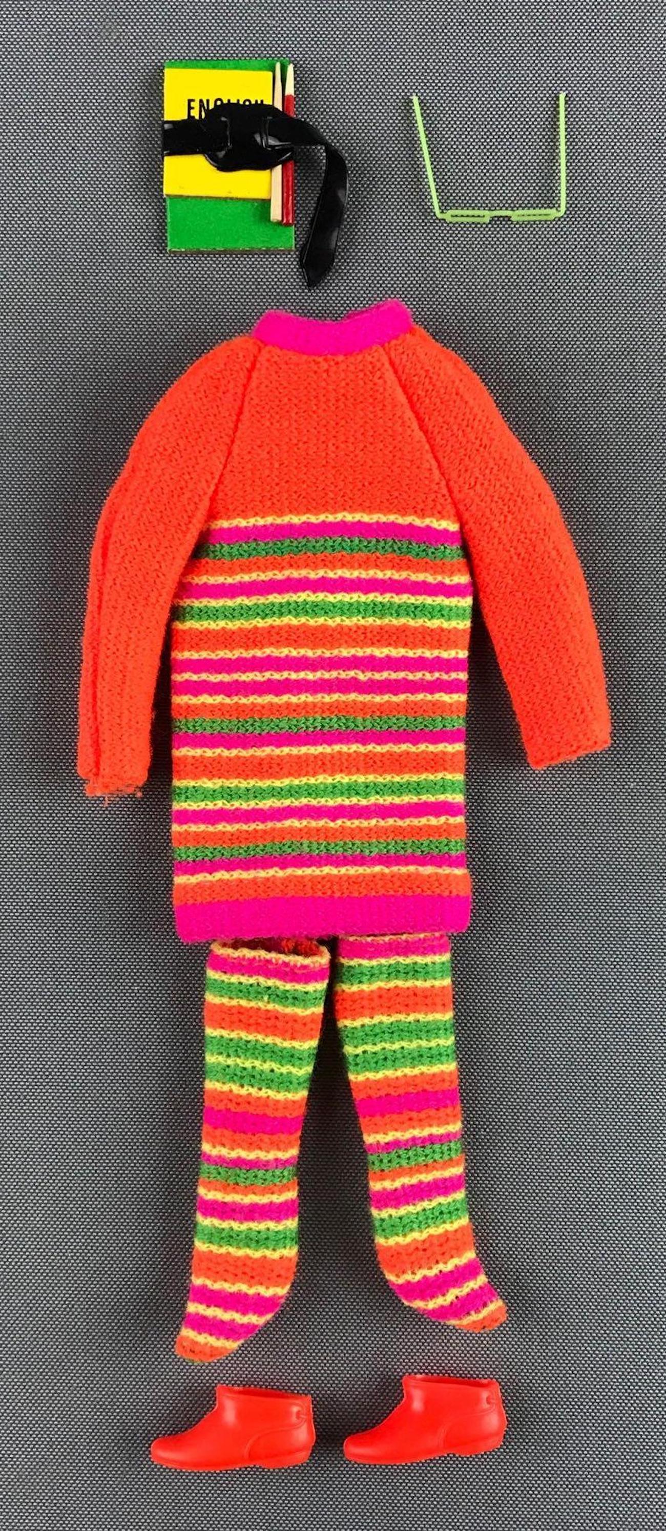 Group of 7 Mattel Barbie Skipper Stripes fashion: Includes sweater, boots, glasses and more. Wear consistent with age and use, in used condition.