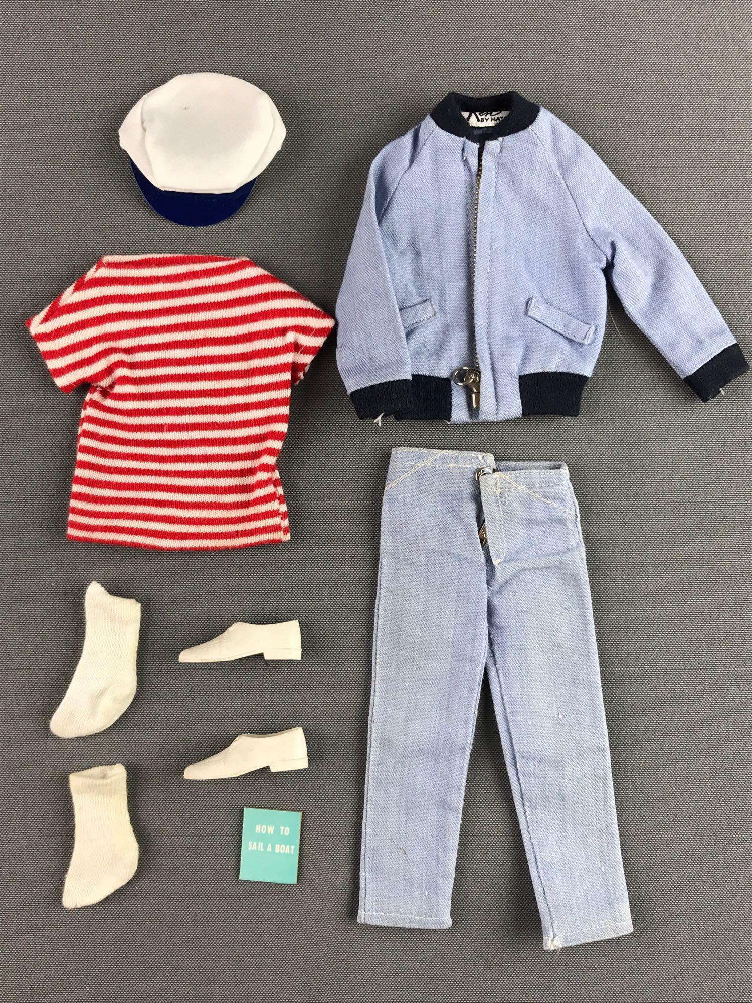 Group of 9 Mattel Barbie Ken The Yachtsman fashion: Manufactured 1962-1963. Includes shoes, How to Sail a Boat book, jacket and more. Wear consistent with age and use, in used condition, some staining.