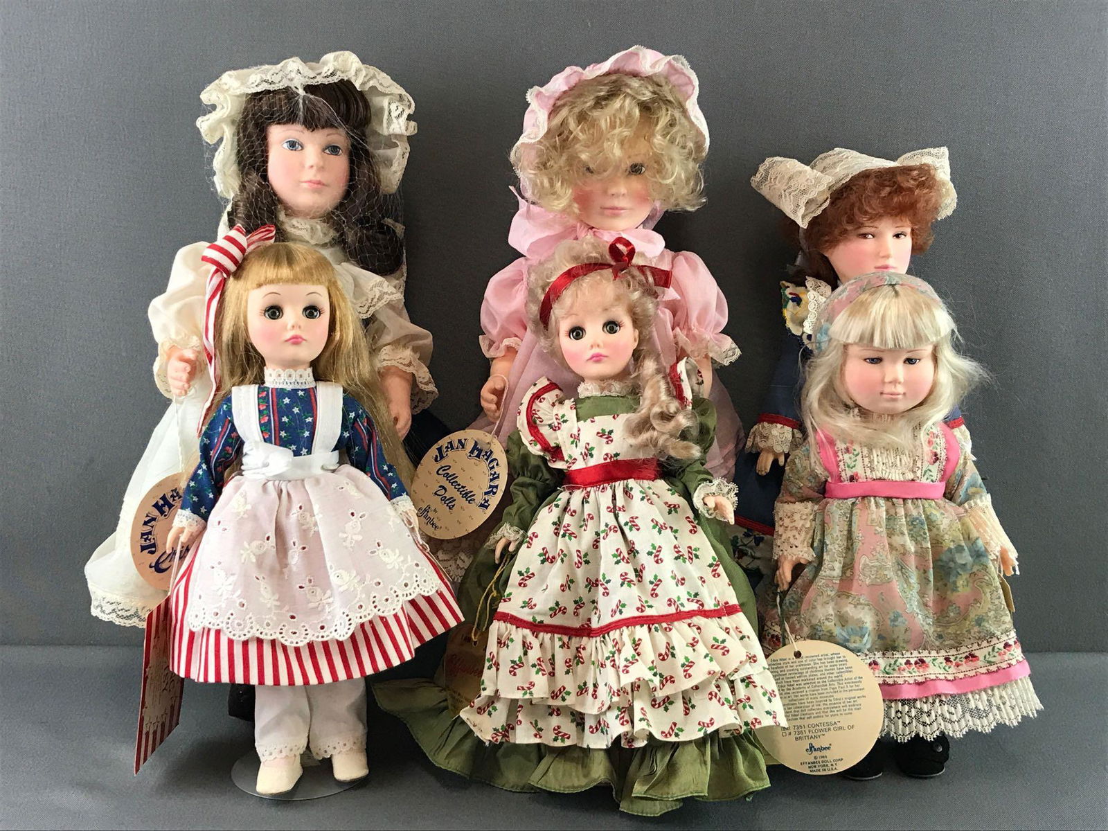 Group of 6 Effanbee dolls: Includes dolls from the Jan Hagara and Edna Hibel collection and more. Includes sleepy eyes, jointed hips and shoulders, eye lashes and more. Largest measures 15 inches. Like new condition.