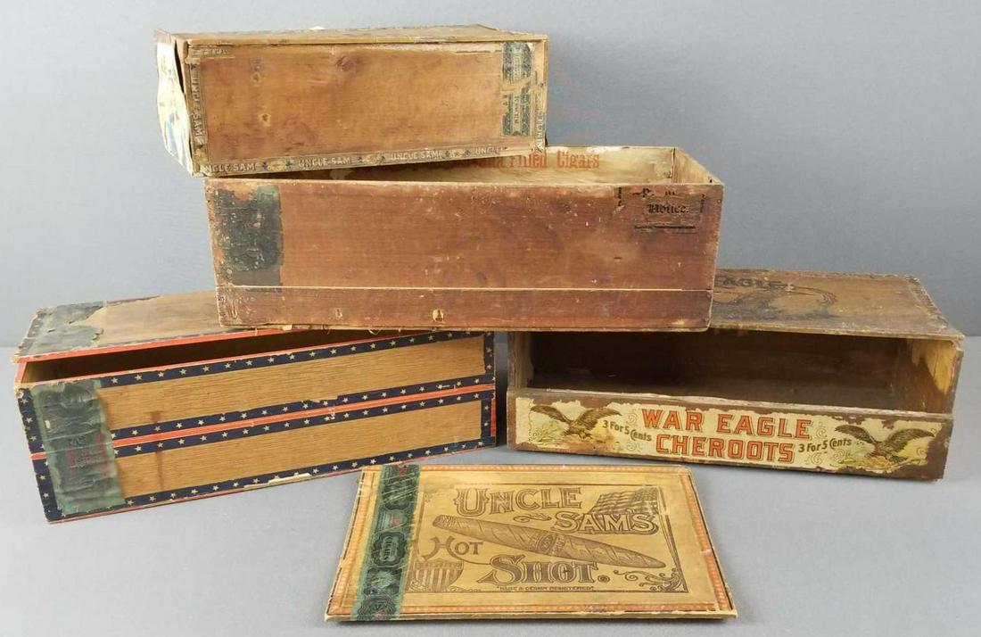 Group of 4 vintage cigar boxes: Also includes one lid, one box without lid. Uncle Sam, War Eagle Cheroots, Army & Navy. Largest is 15 x 7 inches