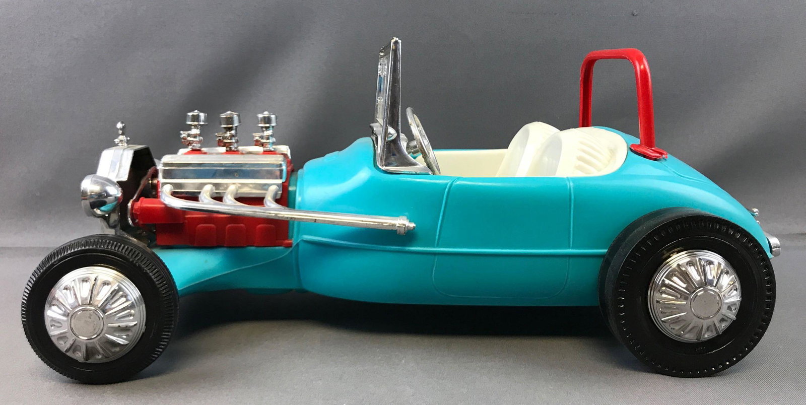Vintage Barbie Hot Rod Blue Roadster: Irwin Mattel, 17 inches long. Roll bar is broken.