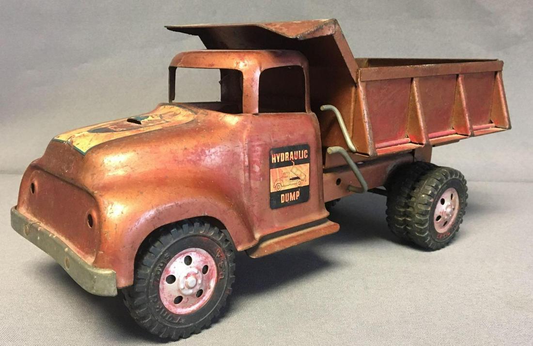 Vintage Tonka die cast Hydraulic Dump Truck: 13 inches long 6 inches tall, missing front grill