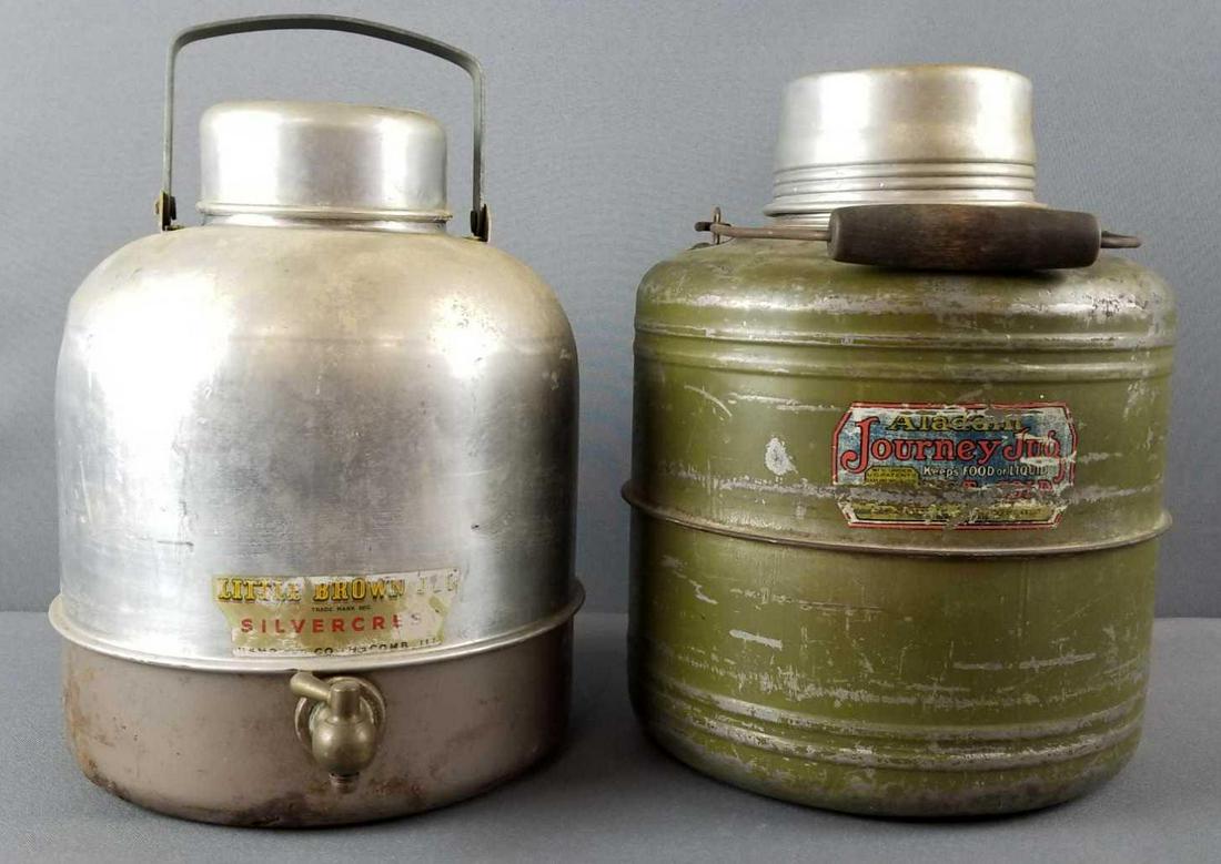 2 vintage jug coolers, Little Brown Jug, Journey Jug: Aladdin Journey Jug, Little Brown Jug silvercrest. Both items show wear from age and use. Aladdin jug is 11.5 inches tall