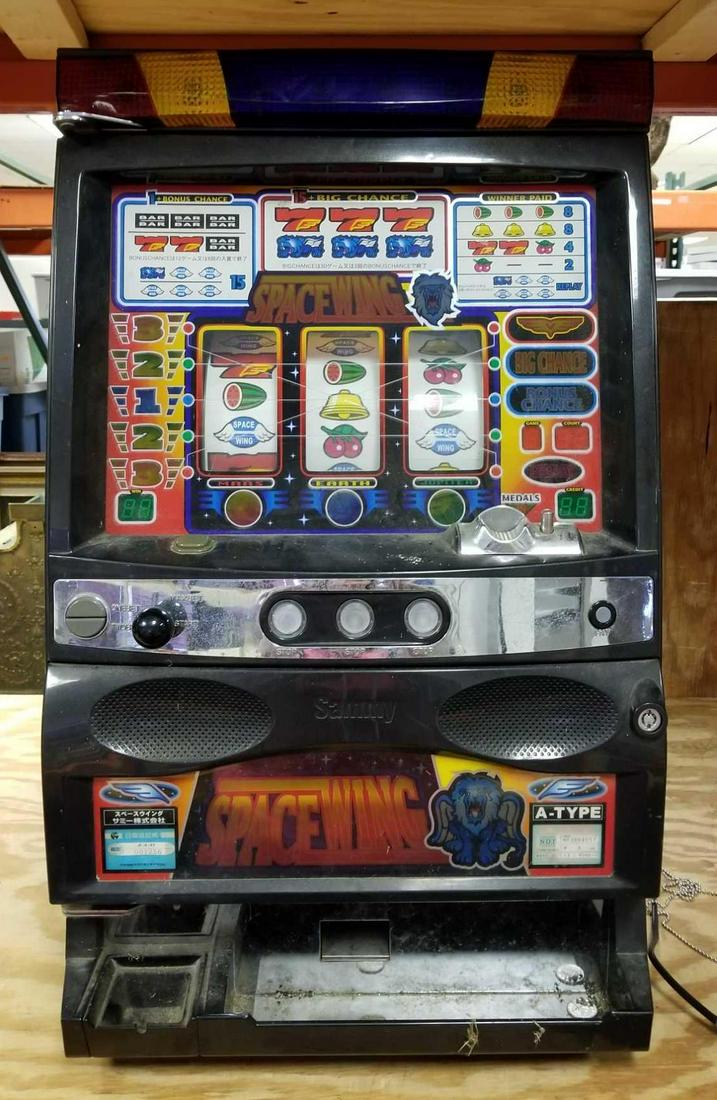 Space Wing slot machine: Only lights up, needs repair. 18 x 32 inches. No shipping available, third party shipping recommended, or pick up.