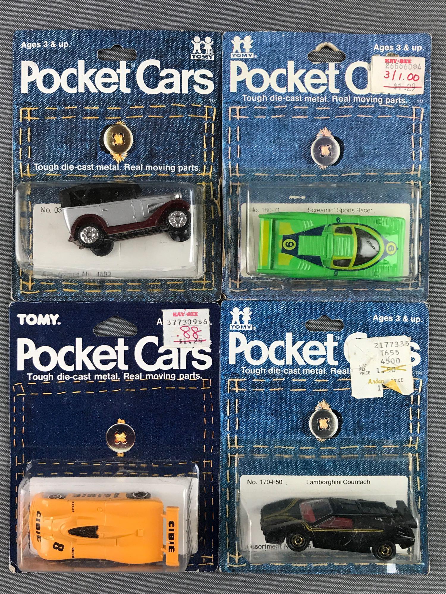 Group of 4 Tomy Pocket Cars die-cast vehicles (1 of 2)