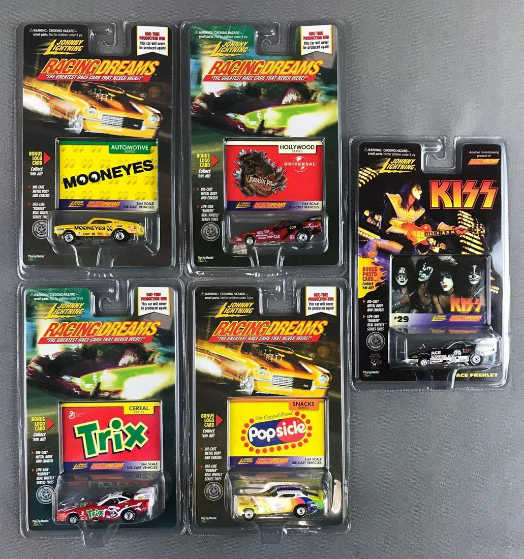 Group of 5 Johnny Lightning Racing Dreams die-cast: By Playing Mantis, new old stock. Includes Universal Jurassic Park, KISS Ace Frehley, Mooneyes and more.