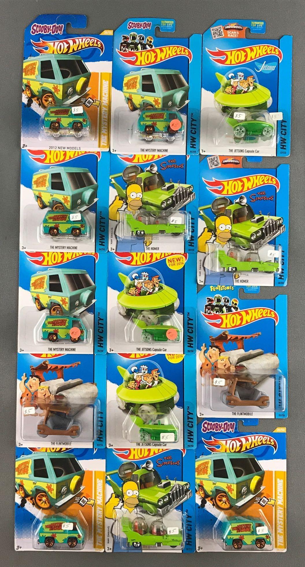 Group of 14 Hot Wheels assorted die-cast vehicles in (1 of 3)