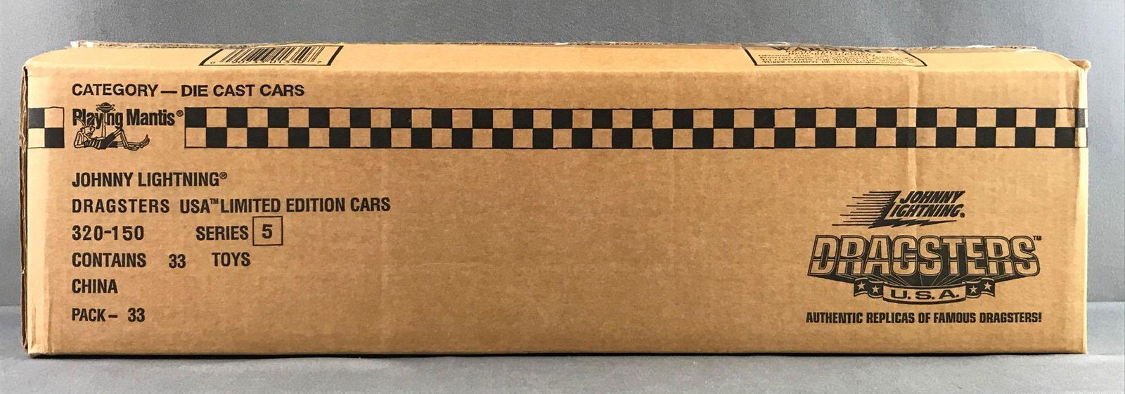 Partial shipping box of Johnny Lightning die-cast cars (1 of 5)