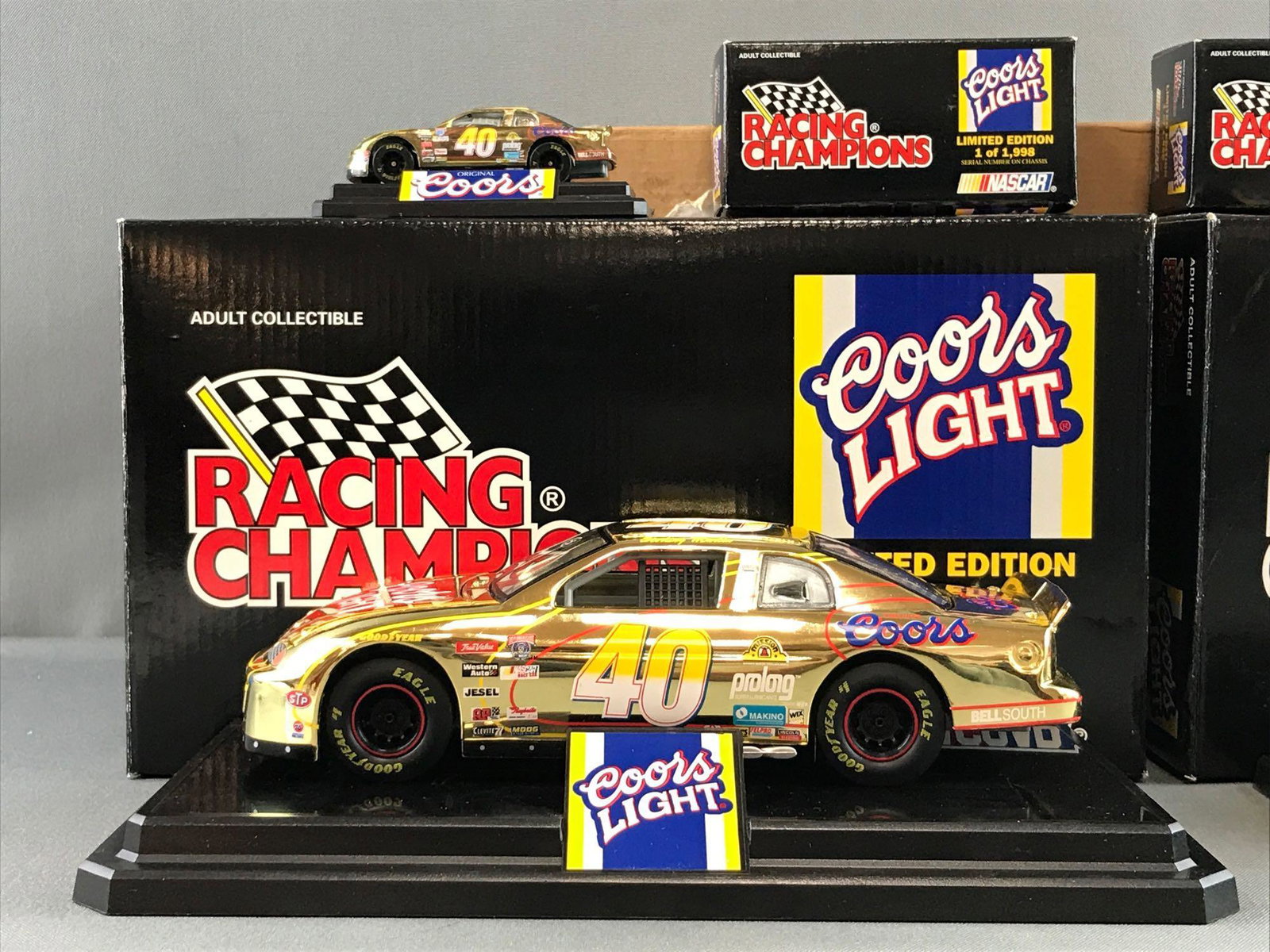 Racing Champions Sterling Martin Coors Light NASCAR: 1:24 scale for larger cars in original packaging and shipping box. Limited edition of 1198, die-cast, cars do have some paint fading and blemishes.