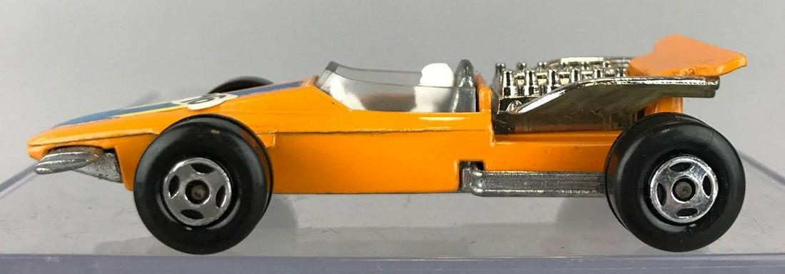Rare Matchbox Superfast No. 34 Formula 1 die-cast: Rare narrow spoke wheels. Orange body, BPW, No. 16, blue/yellow stripe decals. Out of box. 1970