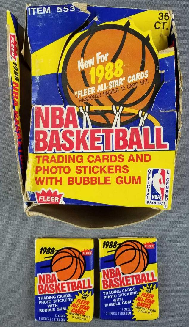 1988 Fleer basketball cards and box: 2 packs of cards, seal is broken.ÊAppear unopened, one has small tear. While it is our opinion that these are original authentic wax packs. We can not guarantee the contents or the authenticity of th