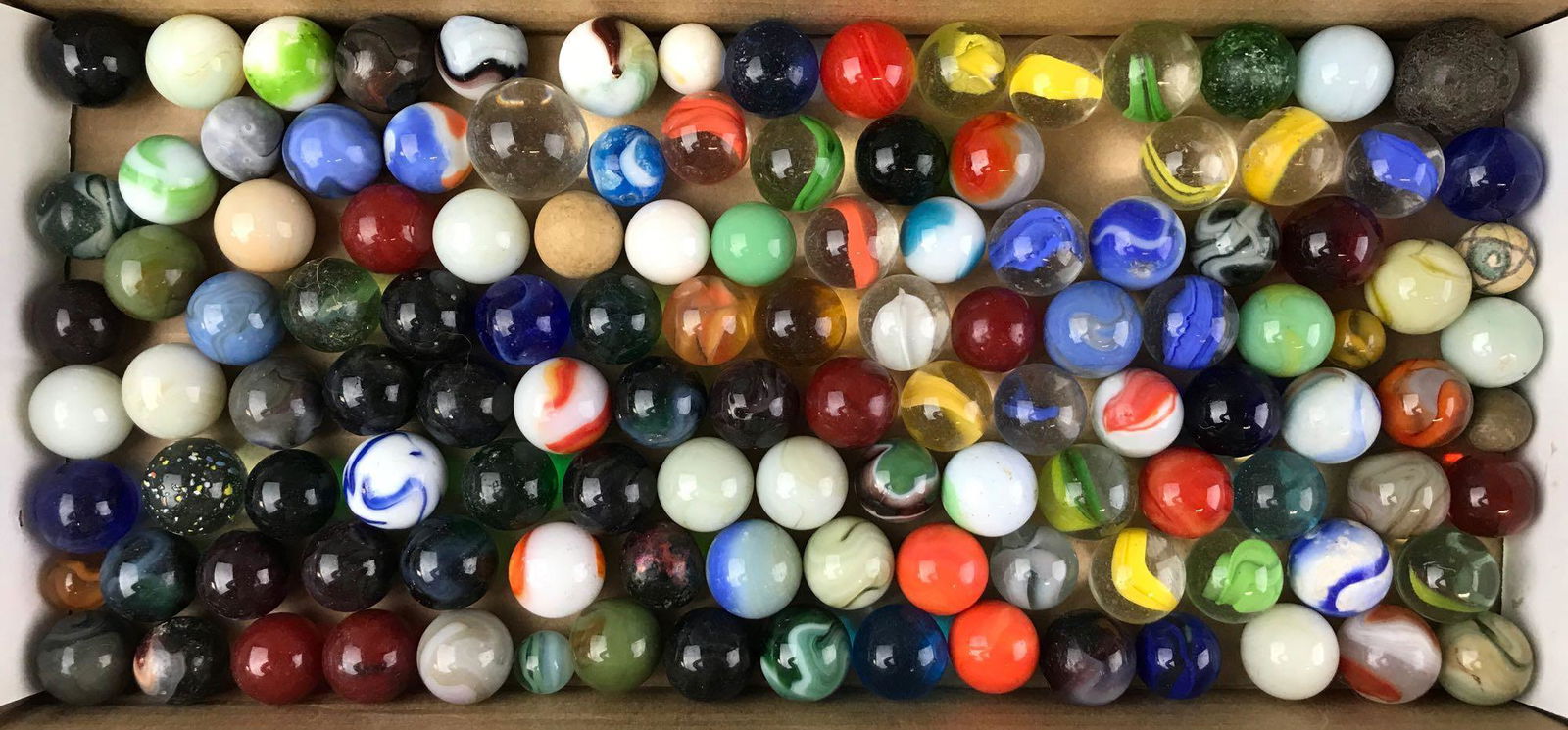 Group of assorted vintage marbles: All shooters and boulders. Assorted types, makers, and materials