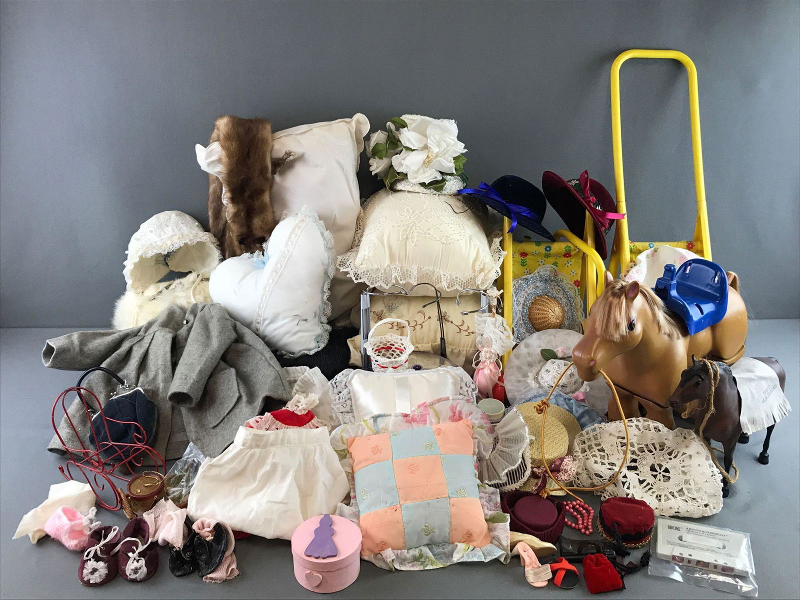 Group of approximately 50 assorted doll items (1 of 4)