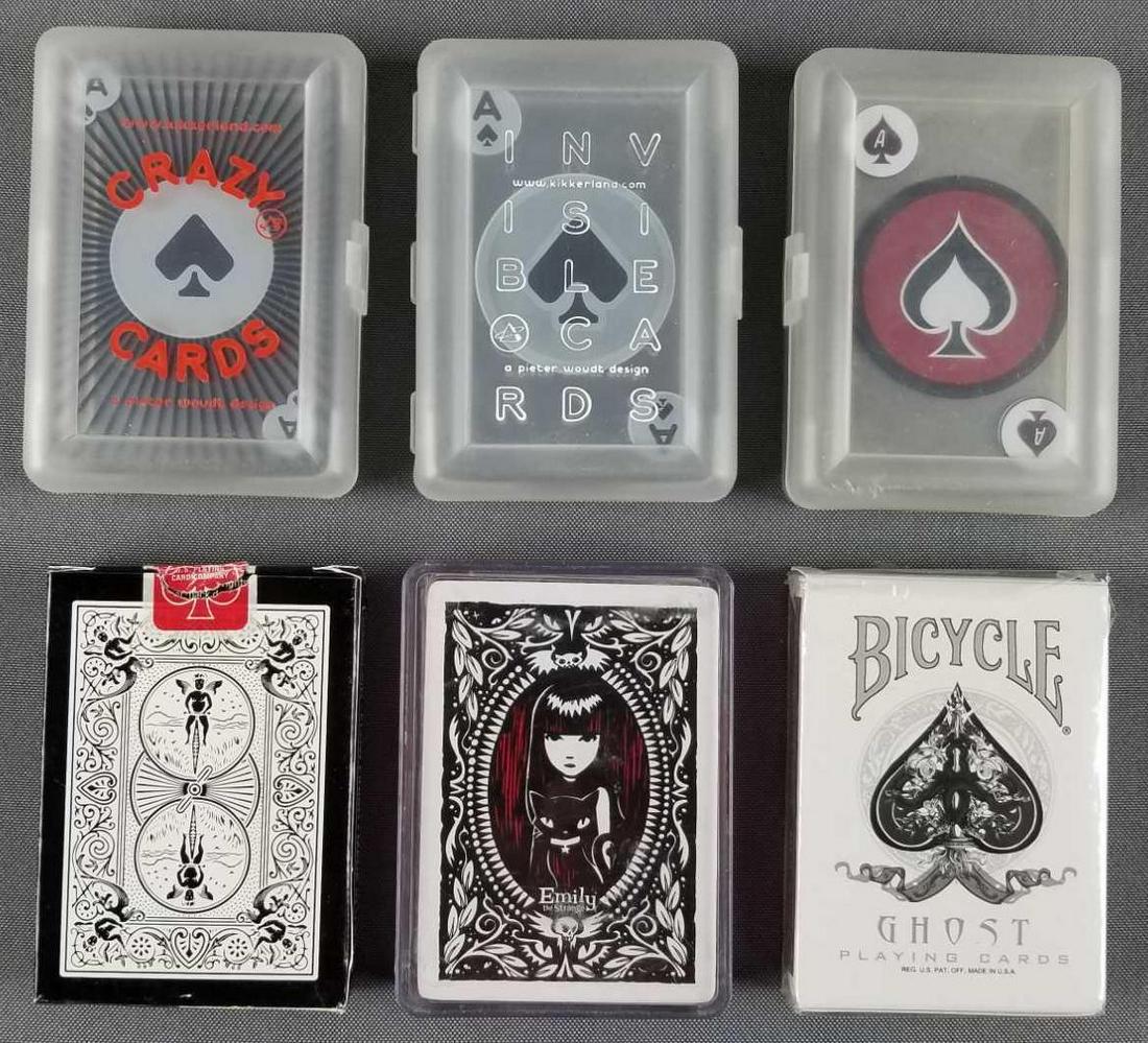 Group of 6 decks of playing cards: 3 decks are clear plastic. All are opened. Unknown completion