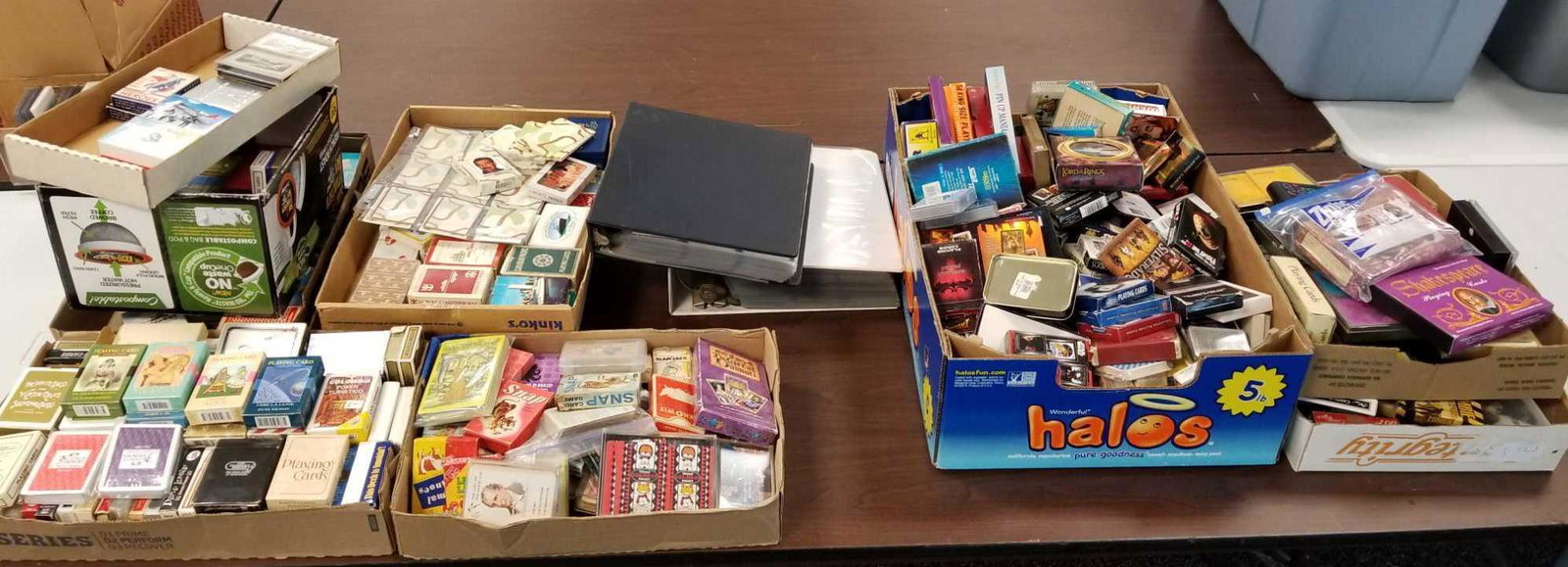 Large group of playing cards: Airlines, railroad, vintage, movies, risque, and many more. Unknown completion. Inclined binders of single cards that have been removed from decks. No shipping available