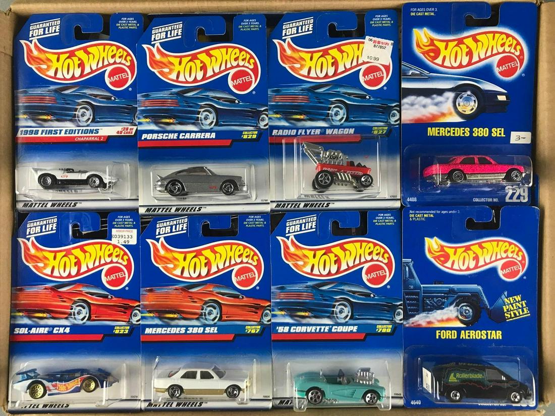 Full shipping box of assorted Hot Wheels die-cast: Includes 58 Corvette Coupe, Porsche Carrera, Mercedes 380 SEL, and more. Die-cast, new in original packaging. Approximately 70 vehicles