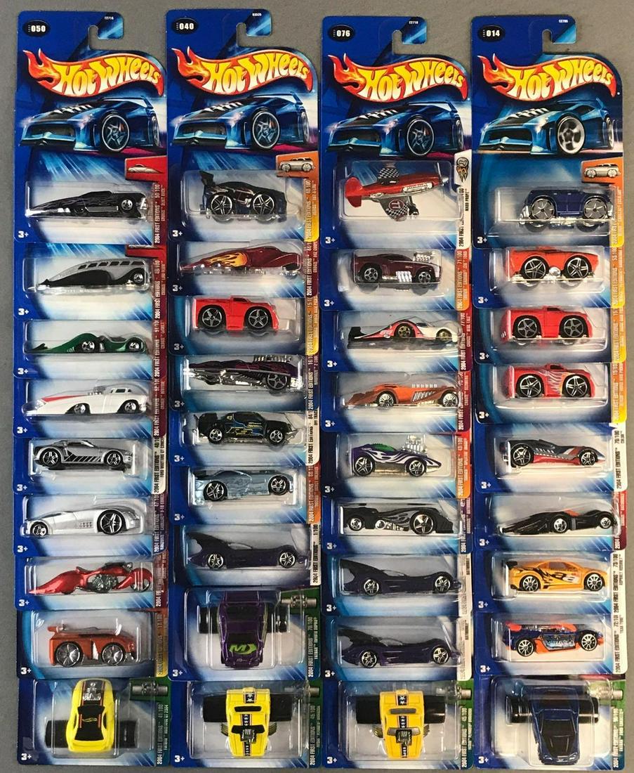 Group of 36 Hot Wheels 2004 First Editions: Includes Fatbax Toyota Supra, Trak-Tune, Off-Track, and more
