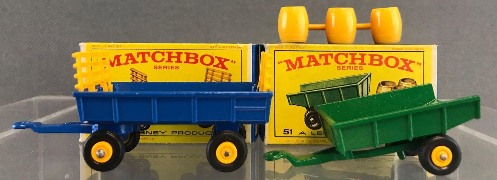Group of 2 Matchbox die-cast trailers: Includes No. 40 Hay Trailer and No. 51 Tipping Trailer