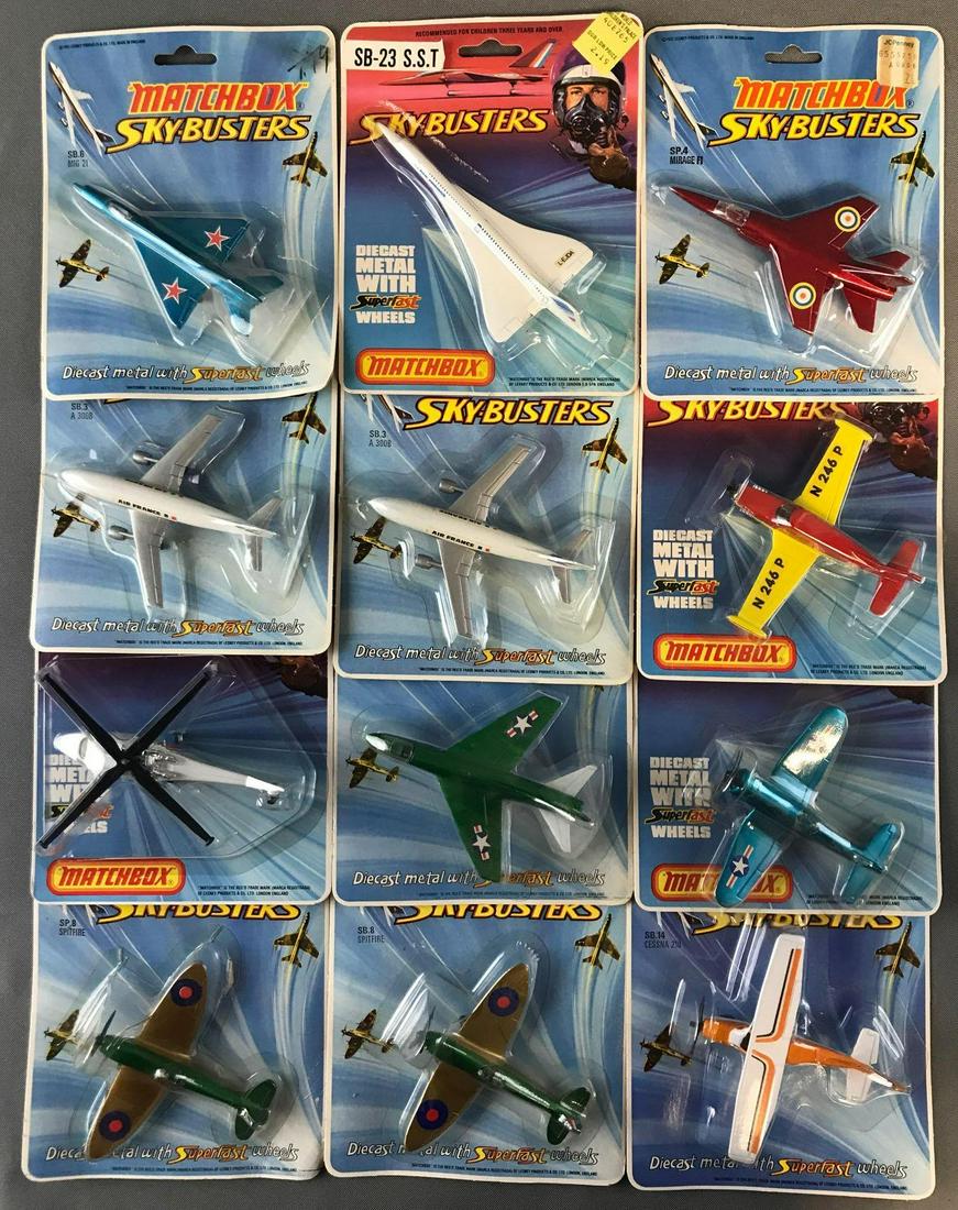 Group of 12 Matchbox Sky-Busters die-cast aircraft: Includes No. SB 3 A 300B, No. SB 14 Cessna 210, No. SB 4 Mirage F1, and more