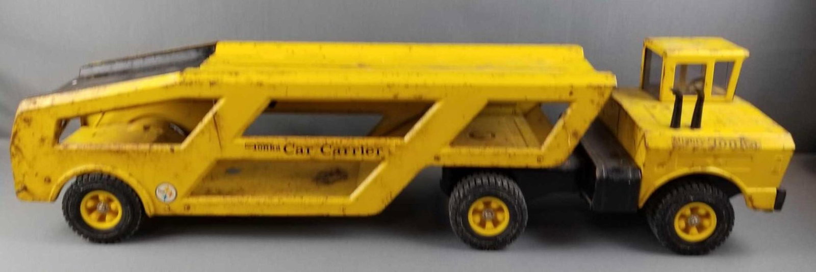 Mighty Tonka car carrier: Steel, circa 1968. Some rust. Used condition. 34 inches long