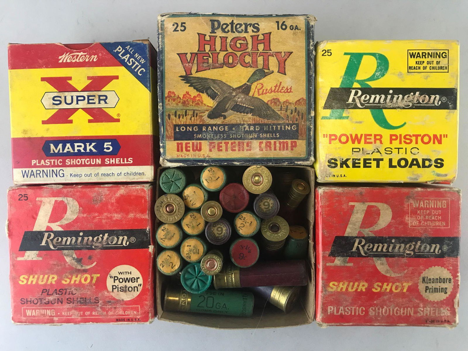 Group of 6 boxes assorted Shotgun Shells: Full and partial boxes, Remington Shur Shot 20 Ga Plastic shells-R 20 M-6 2 1/2-1-6, Western Super X Mark 5 20 Ga plastic shells-2 3/4 in Max Load 1 Oz 7 1/2 Shot, Peters High Velocity 16 Ga 176 3 1/4