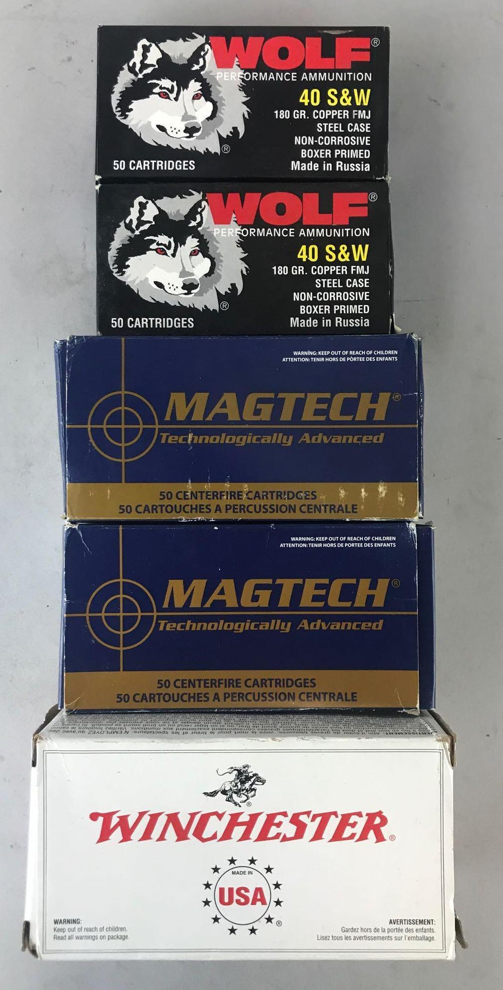 Group of 5 boxes assorted 40 S&W cartridges: Full and partial boxes, (2) Wolf 180 Gr Copper FMJ Steel Case, (2) Magtech 180 Gr FMC, and (1) Winchester 165 Gr FMJ Target/Range