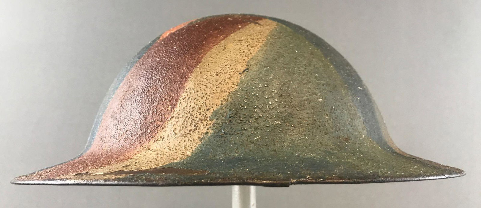 WW1 US Cammo Doughboy Helmet: Partial liner, missing chin strap, marked NC00, cammo has clover design