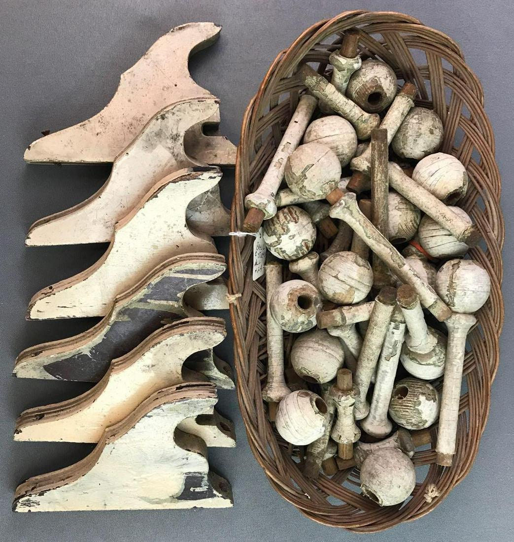 Group of miscellaneous wooden parts: 6 curtain brackets, 1 basket of balls and spindles(uncounted)