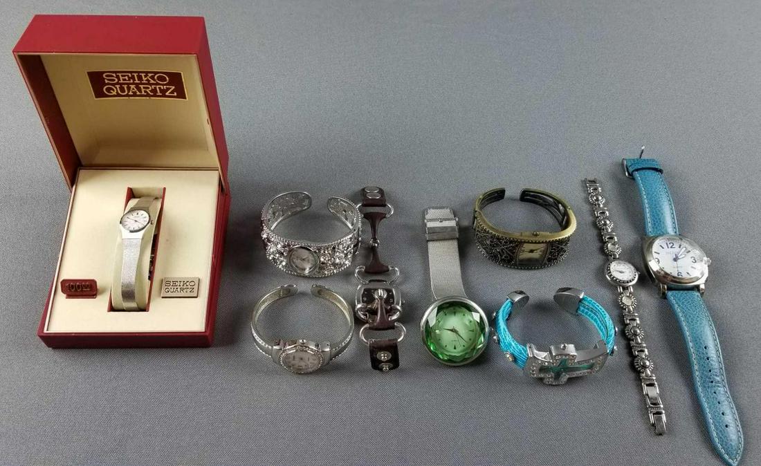 Group of costume jewelry watches: Joan Rivers, Seiko, and more