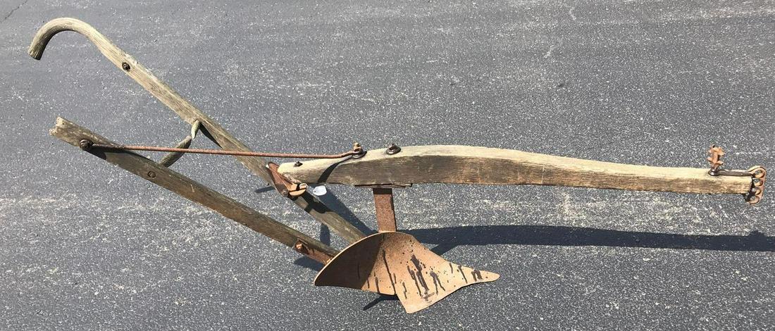 Vintage single bottom plow: Measures approximately 86 x 37 x 16 inches, no shipping available.