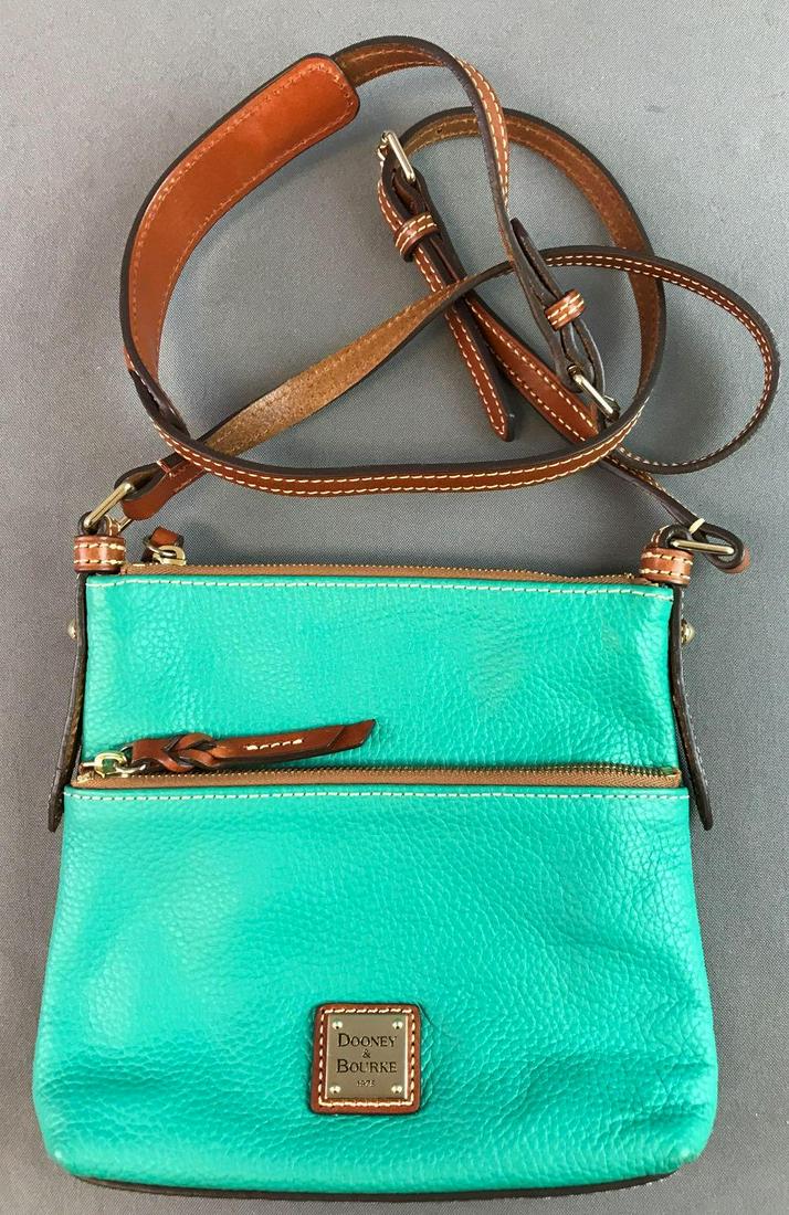 Dooney and Bourke Purse: Measures 9 x 8 x 2 inches.