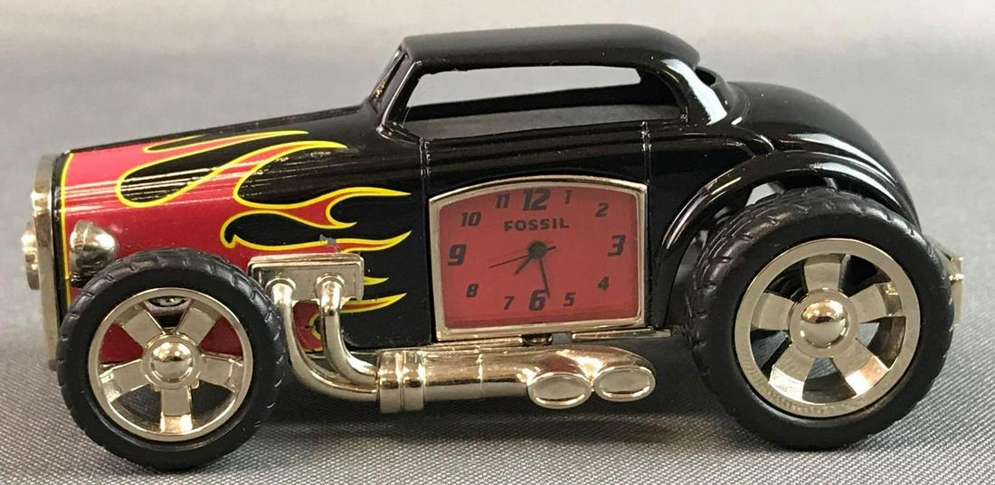 Fossil Streetrod Clock: Measures 4.5 x 2 x 2 inches.
