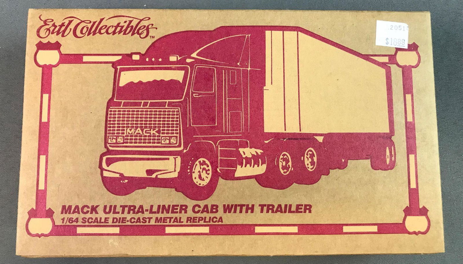 Mack Semi ERTL Collectible Replica: 1/64 scale, new in box, box measures 9 x 5.5 x 2 inches.