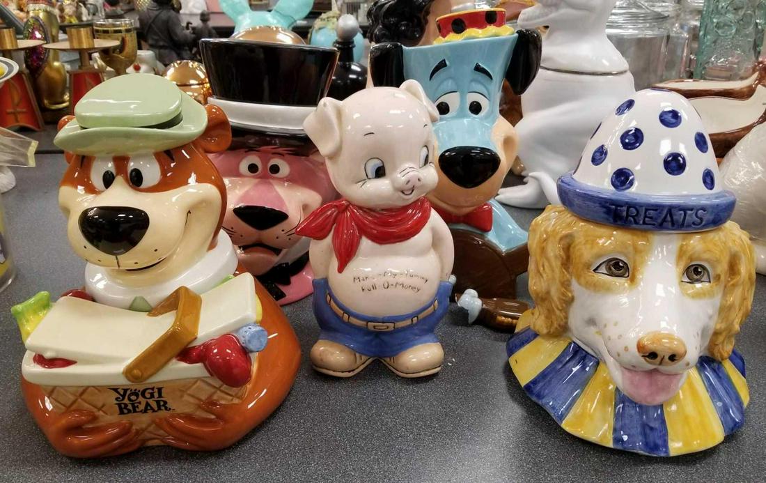 Group of 5 cookie jars, bank: Yogi, Pink Panther, Huckleberry Hound, and others. Huckleberry is broken.