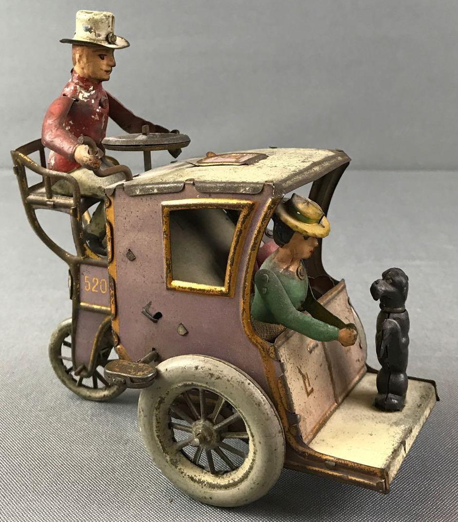 Lehmanns German Made Wind Up Tin Cart Toy: 6 inches tall. Non working condition