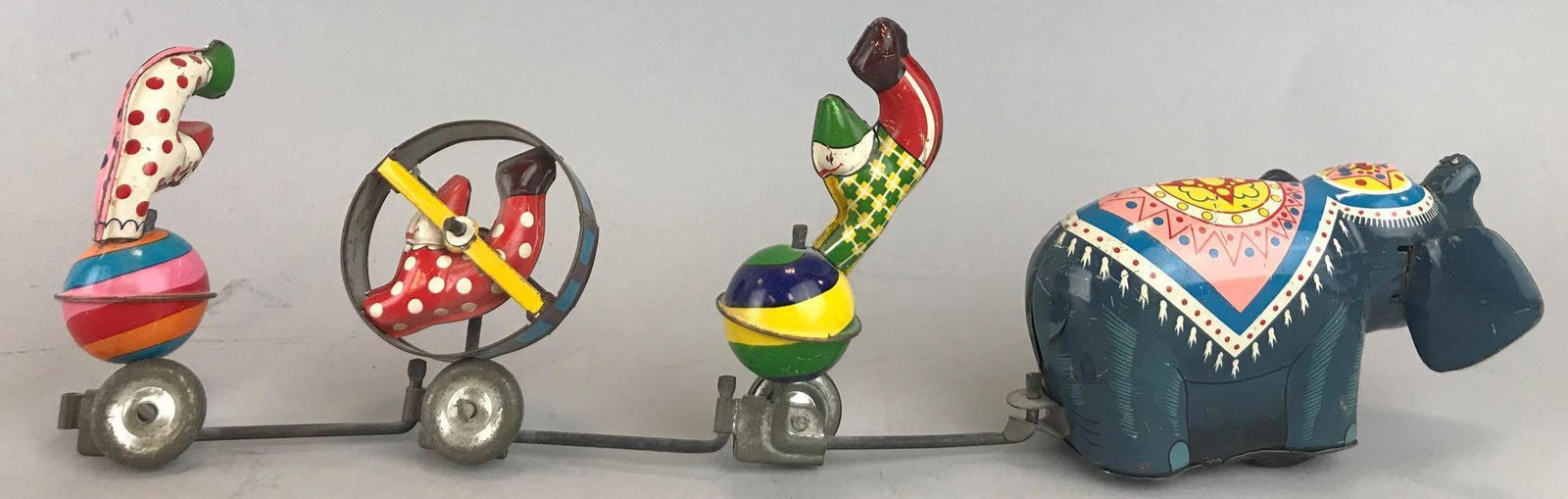 TPS Circus Parade wind-up tin toy: Elephant and clowns, working condition, appx 11.5x3.5 inches