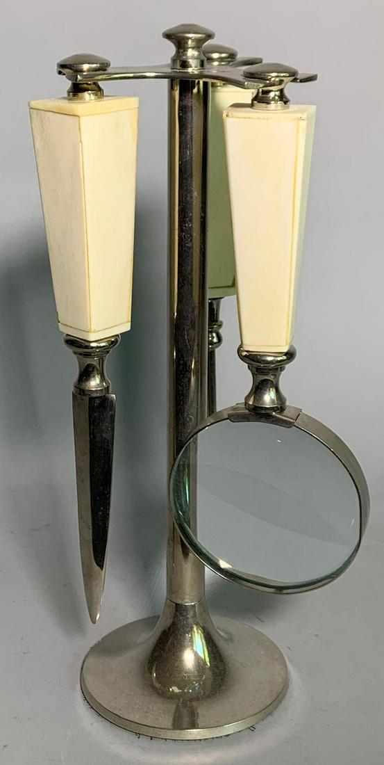 Stag handled desk tool set: Includes magnifying glass, letter opener, and other. Believe the handles are stag/antler or bone. 10 1/2 x 4 inches