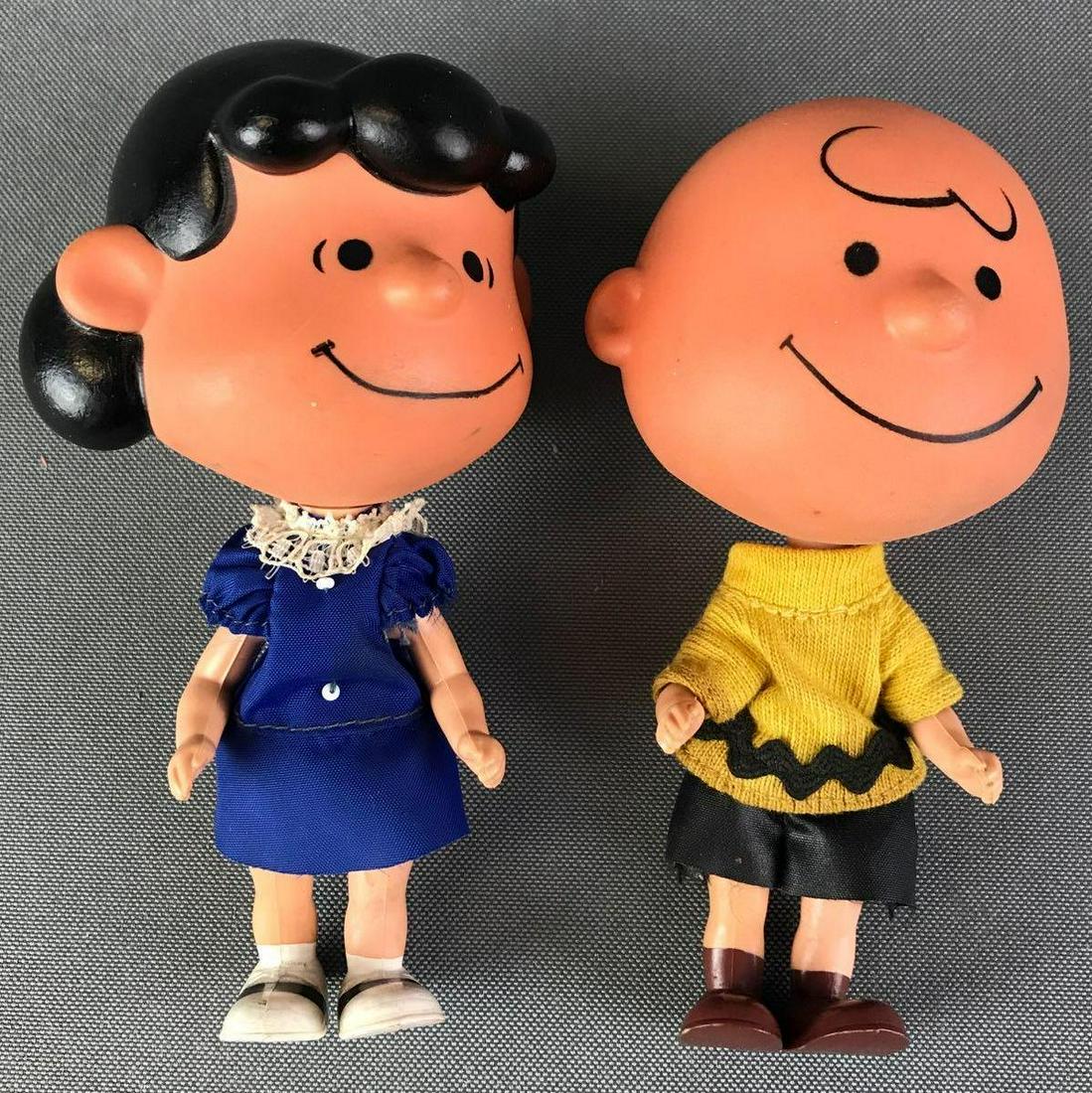 Group of 2 Mattel Charlie Brown Toys: Includes Charlie Brown and Lucy Van Pelt. Circa 1967.