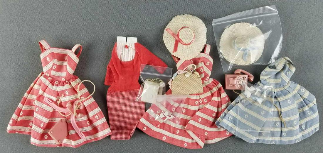 Group of vintage Barbie clothing: Sets and separates. Some include accessories